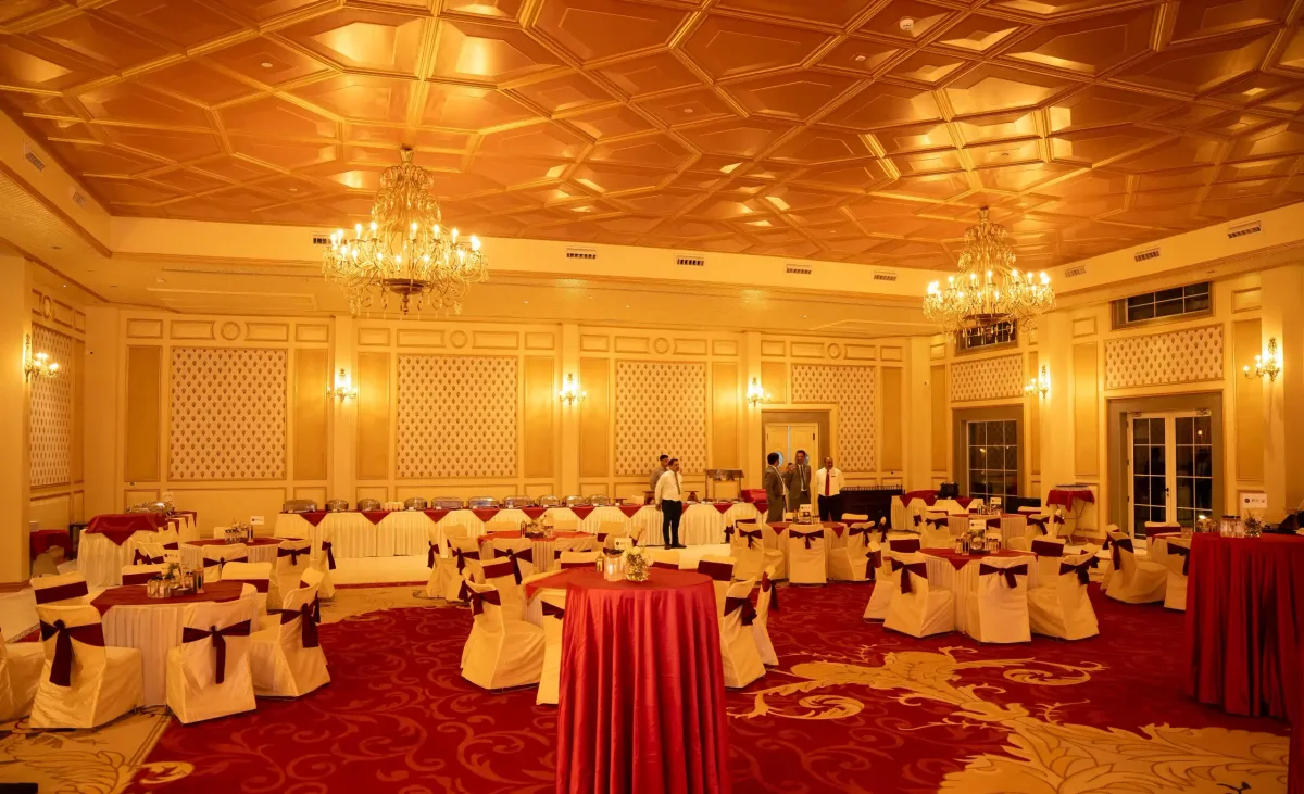 The grand chandeliered banquet hall at Narain Niwas Palace, set for a reception